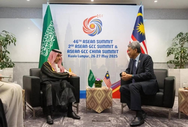 Saudi Minister of Foreign Affairs Prince Faisal bin Farhan holds talks with his Malaysian counterpart Dato' Seri Utama Haji Mohamad bin Haji Hasan in Kuala Lumpur on Tuesday.