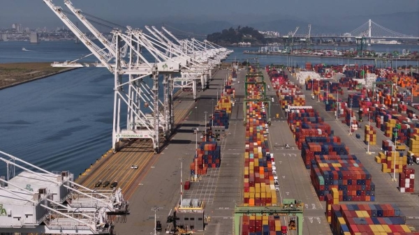 In an aerial view, shipping cranes sit idle at the Port of Oakland on April 28 in Oakland, California