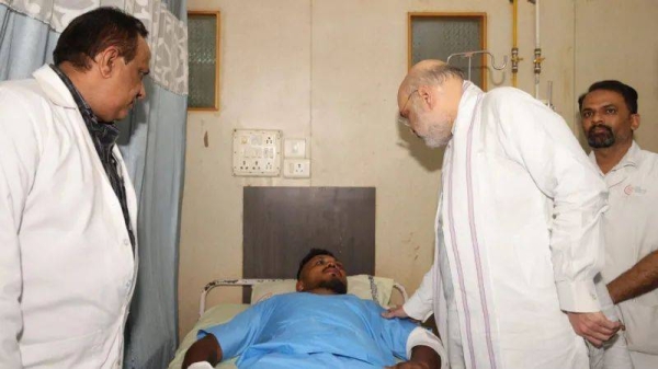 Vishwashkumar Ramesh lying in hospital bed