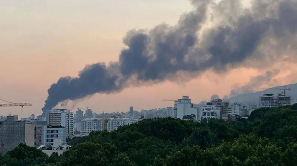 Smoke billowed from the headquarters of Iran's state broadcaster following the Israeli air strike