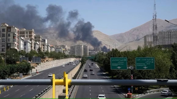Smoke rises from an oil storage facility after it appeared to have been struck by an Israeli strike in Tehran, Iran, on Monday.