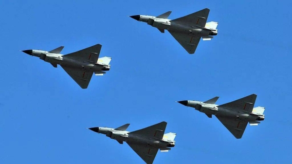 J-10 jet fighters perform in formation to celebrate the 60th anniversary of the People's Liberation Army Air Force in Beijing (File photo)