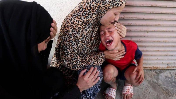 Children queuing for supplements killed in Israeli strike in Gaza
