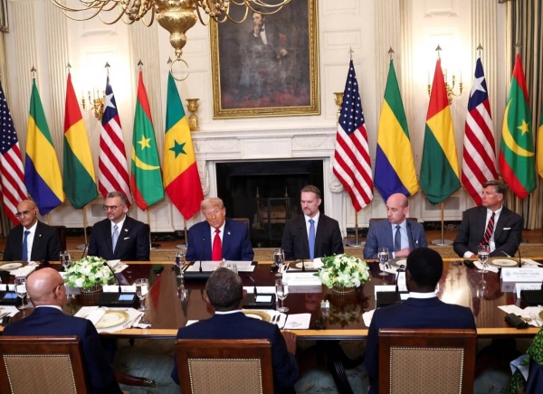 Trump praises Liberia's president for English skills at a White House lunch.