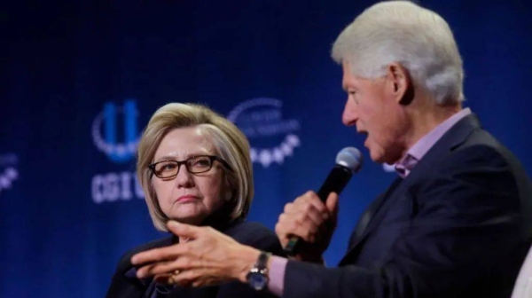Bill and Hillary Clinton appear onstage together at an event