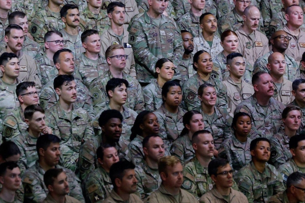 US troops at Al Udeid Air Base in Doha, Qatar gather to listen President Donald Trump deliver remarks during a visit he made in May.