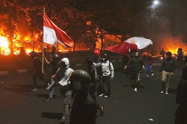 Indonesian parliament buildings torched amid protests over lawmakers’ perks; at least 3 dead