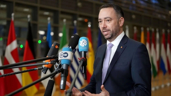 Belgian Foreign Minister Maxime Prevot speaks with media as he arrives for a meeting of EU foreign ministers at the European Council building, Brussels, Monday, Feb. 24, 2025 -