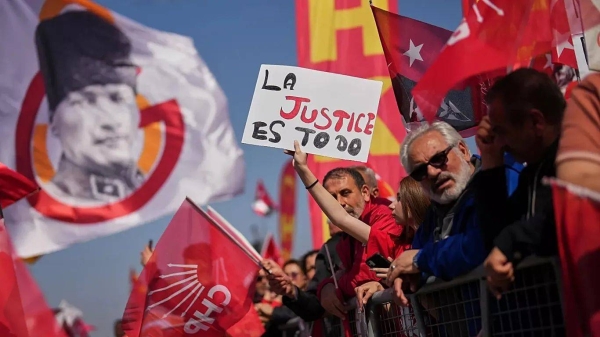 People listen to speeches during a rally called by Republican People's Party in Istanbul, 29 March, 2025