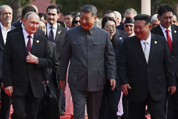 Vladimir Putin, Xi Jinping and Kim Jong Un arrive at a military parade to mark the 80th anniversary of the end of WWII in Beijing, China, Wednesday, Sept. 3, 2025