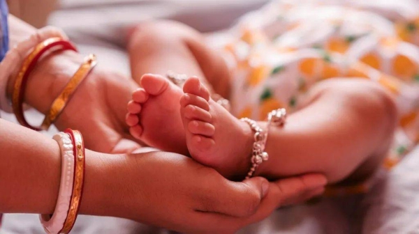 The baby had a bloated stomach and was unable to consume food