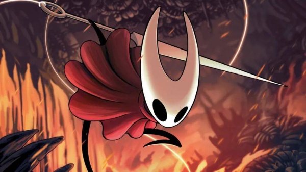 The main character from Hollow Knight wielding its sword-like weapon. It is a cartoon insectoid figure wearing a red cape and holding a nail. In the background, flames burn around a forest scene