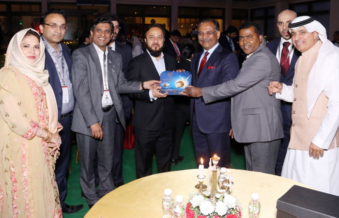 Zafar Sareshwala, chancellor of Maulana Azad National Urdu University and founder of Parsoli Group, along with SIBN delegates at the Vibrant Gujarat Summit. — Courtesy photo