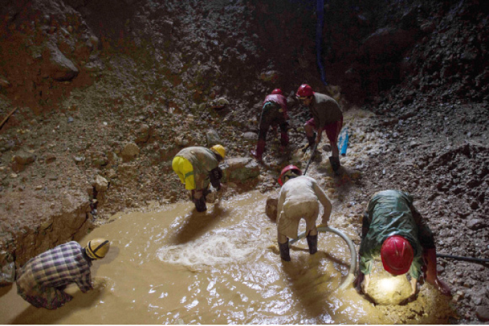 Miners working inside a ruby mine in Mogok, north of Mandalay, Myanmar, in this Nov, 24. 2016 file photo. — AFP