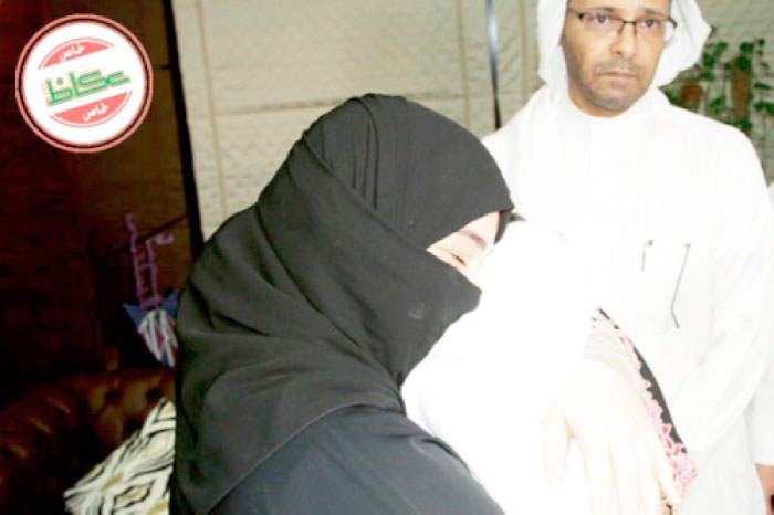 Nareman holds her infant daughter Dareen. — Okaz photo