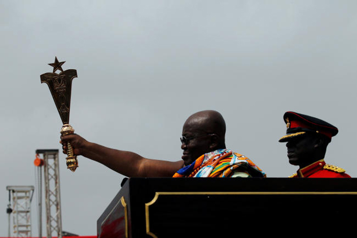 Ghana’s new President Nana Akufo-Addo lifts up a staff of office during the swearing-in ceremony at Independence Square in Accra, Ghana, on Saturday. — Reuters