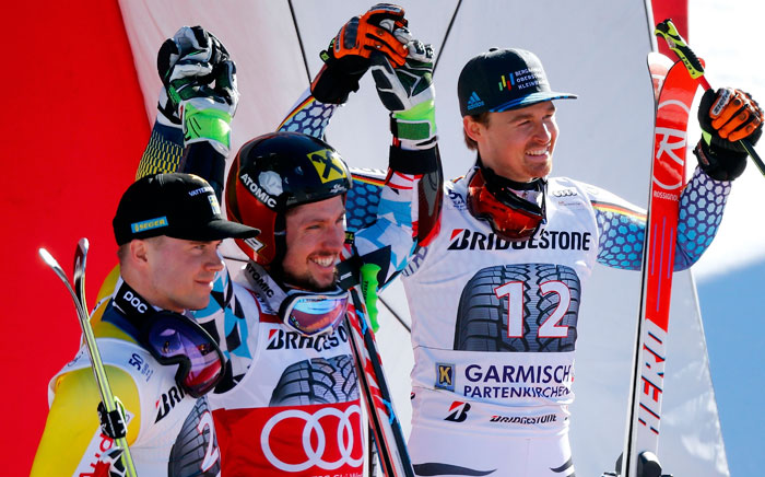 (L-R) Sweden's Matts Olsson, Austria's Marcel Hirscher and Germany's Stefan Luitz on the podium after the race. — Reuters