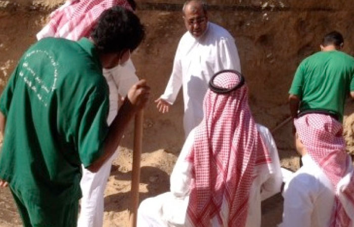Members of the fact-finding committee visit the site to take evidence.