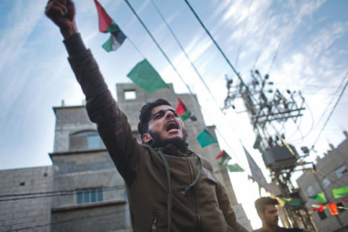 A Palestinian chants slogans during a demonstration against the chronic power cuts in Jabaliya refugee camp, Northern Gaza Strip, Thursday. Thousands of people took to the streets on Thursday to protest chronic power cuts in the Hamas-ruled Gaza Strip, in one of the largest unauthorized protests in the territory since the militant group took power a decade ago. — AP