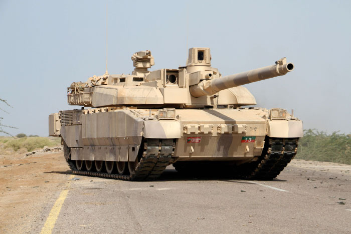 A Yemeni loyalist forces' tank patrols highway in the Red Sea port town of Mocha. — AFP
