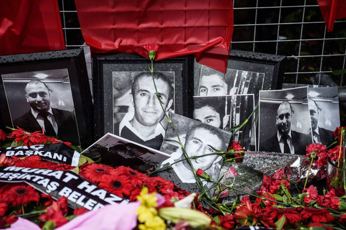 Flowers and pictures of victims have been laid in front of the Reina nightclub in Istanbul, four days after a gunman killed 39 people on New Year’s night. Elite Turkish police arrested several people during fresh raids over the nightclub attack that killed 39, as authorities tightened Turkey’s borders to prevent the fugitive killer from escaping. — AFP