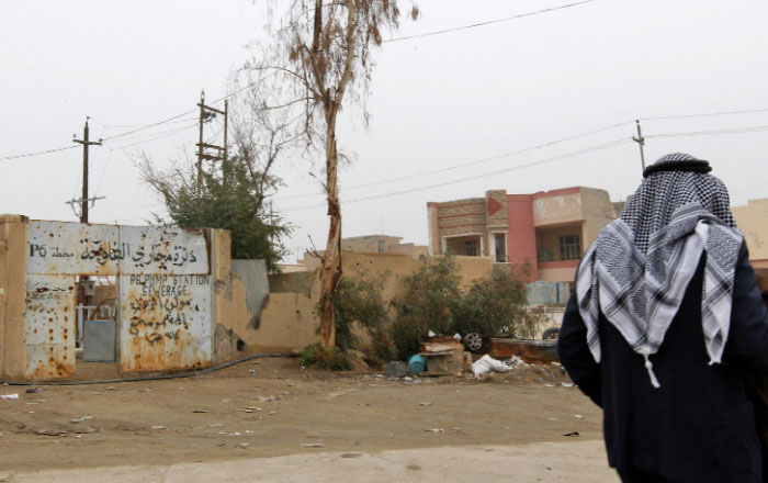 An Iraqi walks in a street in the city of Falluja, that was recaptured from Daesh (the so-called IS) group about six months ago, as life starts to slowly return to the city. Six months after the takeover of Falluja, the entire neighborhoods of this Sunni city are still in ruins and the Iraqi government is likely to alienate its inhabitants if reconstruction does not accelerate. — AFP