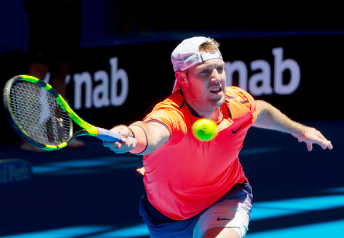 Jack Sock of the US hits a return against Adam Pavlasek of the Czech Republic during their Hopman Cup Tennis Tournament match in Perth Sunday. — AFP