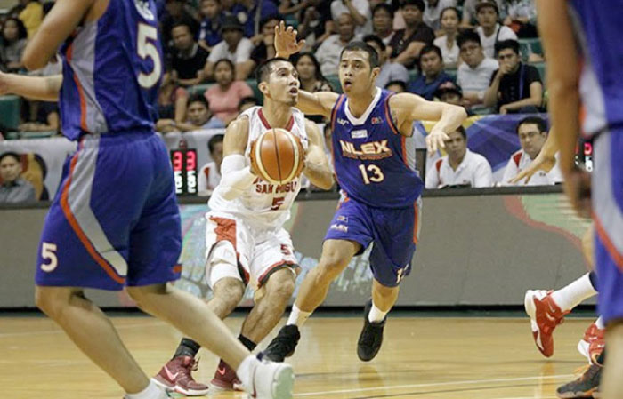 Ginebra's LA Tenorio is hounded by NLEX's Garbo Lanete in their PBA Philippine Cup game at the Cuneta Astrodome on Sunday night. — SG photo