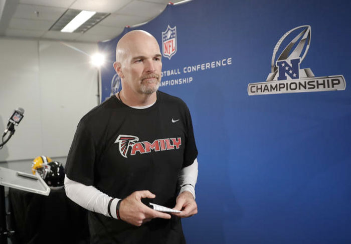 Atlanta Falcons head coach Dan Quinn steps away from the microphone after a news conference before an NFL football practice  on Thursday in Flowery Branch, Ga.. The Falcons will face the Green Bay Packers in the NFC Championship on Sunday in Atlanta. — AP