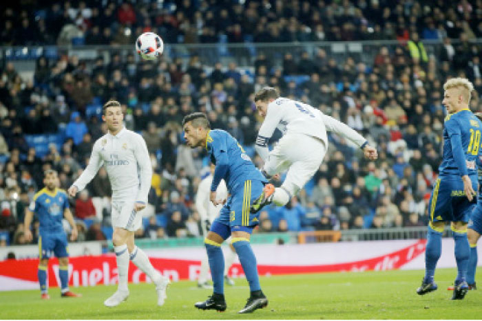 Real Madrid’s Sergio Ramos (Center R) heads a ball on goal during their Copa del Rey quarterfinal 1st-leg match  against Celta in Madrid Wednesday. - AP