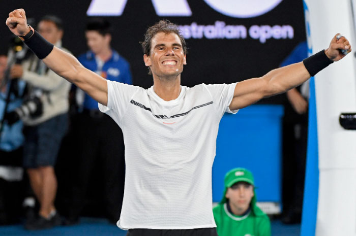 Spain’s Rafael Nadal celebrates his victory against Bulgaria’s Grigor Dimitrov during their men’s singles semifinal match of the Australian Open in Melbourne Friday. - AFP