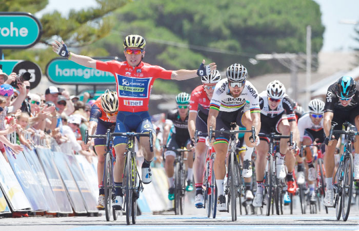 Australia’s Caleb Ewan (L) from Orica wins stage three of the Tour Down Under cycling race from Glenelg to Victor Harbour near Adelaide Thursday. - AFP