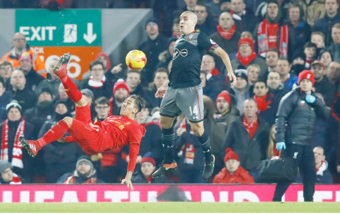 Liverpool’s Roberto Firmino attempts an overhead kick during their League Cup match against Southampton at Anfield Wednesday. - Reuters