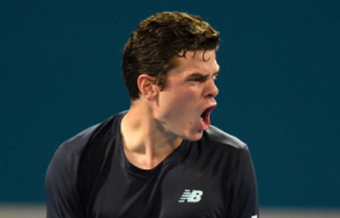 Canada’s Milos Raonic reacts after winning his match against Spain’s Rafael Nadal in Brisbane Friday. - Reuters