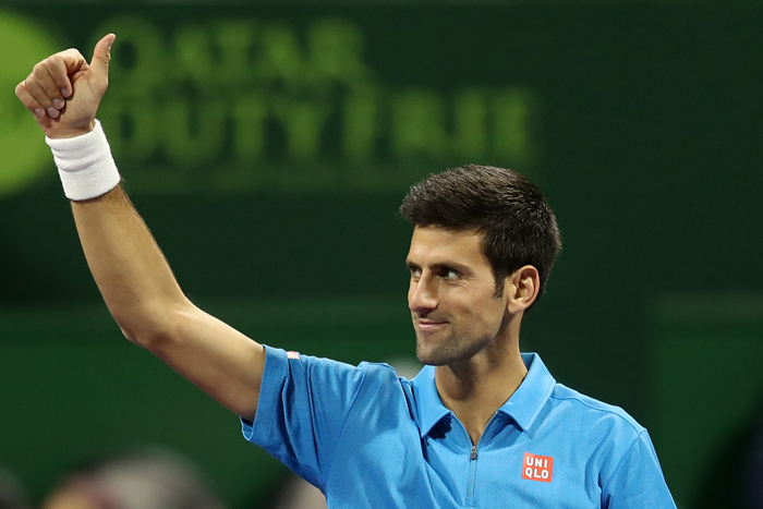 Serbia's Novak Djokovic celebrates after beating Czech Republic's Radek Stepanek at the ATP Qatar Open Tennis Tournament in Doha Thursday. — AFP