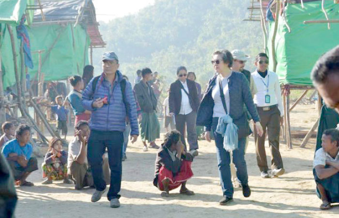 UN special rapporteur on Myanmar, Yanghee Lee, center right in blue jacket, is being escorted during a visit to the Rakhine ethnic Sein Pan Myaing village, near the town of Maungdaw in strife-torn Rakhine State near the Bangladesh border in this file photo. — AFP