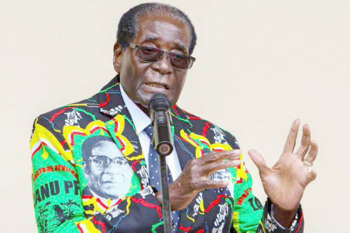 Zimbabwe President Robert Mugabe speaks during the opening of a community information centre in Masvingo alongside the party’s annual conference in  Masvingo, Zimbabwe, in this Dec, 17, 2016 file photo. — AFP