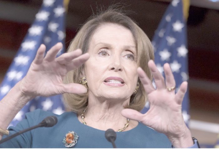 House Minority Leader Nancy Pelosi of California responds to questions about Russian hacking and the Trump transition during a news conference on Capitol Hill in Washington D.C., on Friday. — AP