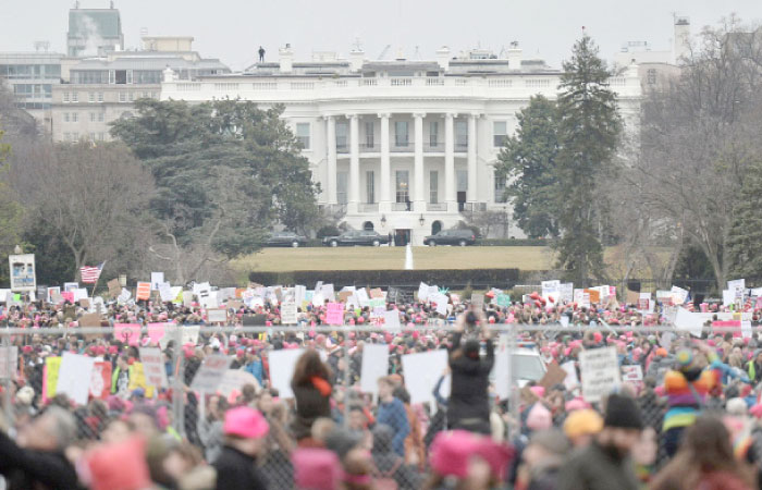Demonstrators protest  near the White House in Washington, D.C., for the Women’s March on Saturday. — AFP