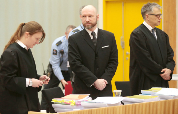 Mass murderer Anders Behring Breivik, center, is pictured on the second day of his of hearing of appeal in Borgarting Court of Appeal at Telemark prison in Skien, Norway, on Wednesday. — AFP