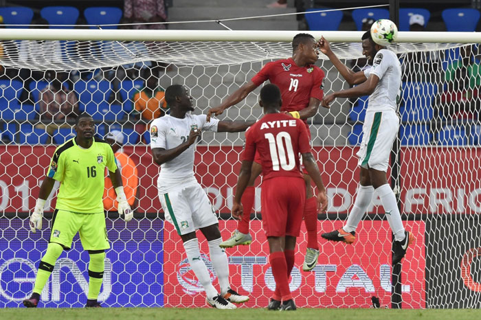 Ivory Coast’s defender Wilfried Kanon (R) jumps for a header next to Togo’s forward Kodjo Fo-Doh Laba as Togo’s goalkeeper Kossi Agassa (L) prepares to block the shot during their 2017 Africa Cup of Nations match in Oyem Monday. - AFP