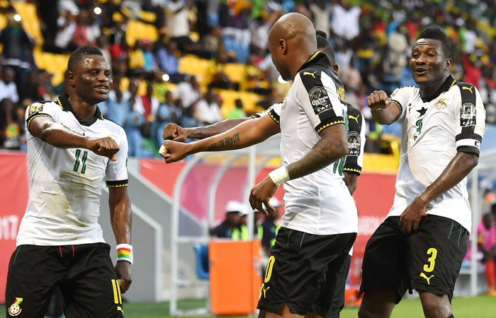 Ghana’s forward Andre Ayew (C) celebrates with teammates after scoring a goal during their 2017 Africa Cup of Nations Group D match against Uganda in Port-Gentil Tuesday. - AFP