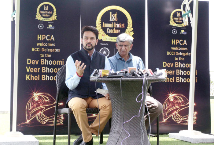 In this photograph taken on June 24, 2016, president of the Board of Control for Cricket in India (BCCI) Anurag Thakur (L) addresses a press conference in Dharamsala. - AFP