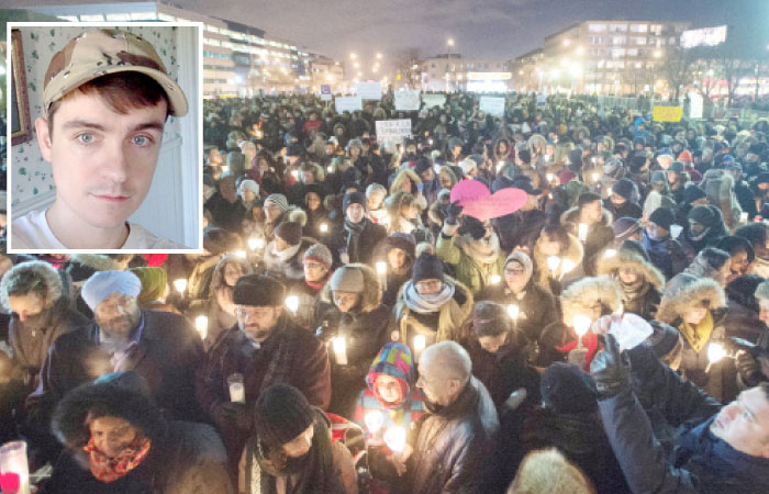 People hold candles for victims of Sunday’s deadly shooting at a Quebec City mosque, during a vigil in Montreal, Canada on Monday. (Inset) Alexandre Bissonnette, who made a brief court appearance after surrendering to authorities. — AP