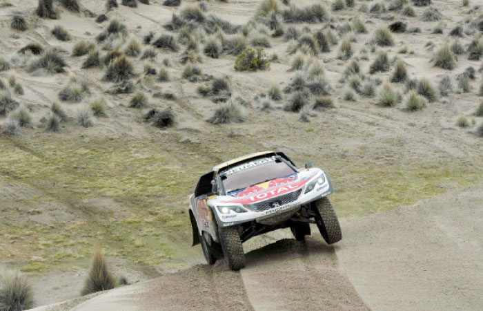 Peugeot’s driver Stephane Peterhansel and his co-driver Jean Paul Cottret of France compete during the Stage 7 of the Dakar 2017 between La Paz and Uyuni, Bolivia, Monday. - AFP