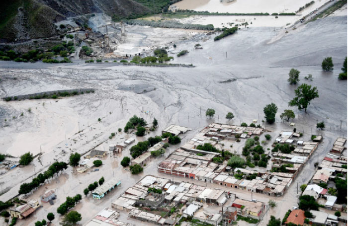 Roads are covered in mud after a landslide triggered by a storm in the village of Volcan, Argentina, photographed during stage 8 of the Dakar Rally between Uyuni, Bolivia and Salta, Argentina, Tuesday. — AP