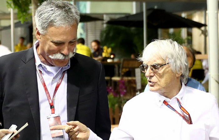 New F1 chairman Chase Carey with Bernie Ecclestone (R) at the Singapore GP