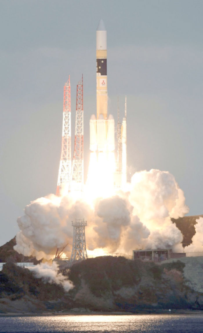 Japan’s H-2A rocket lifts off carrying Defense Ministry’s first communications satellite Kirameki-2 from the Tanegashima Space Center in Minamitane on Tanegashima Island, southern Japan, on Tuesday. — AP