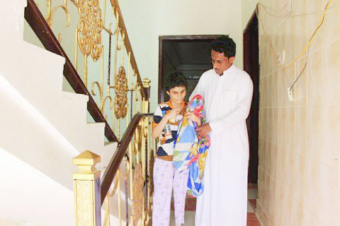 Nine-year-old Raghad with her father Mohammad Aziri.