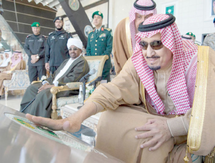 Custodian of the Two Holy Mosques King Salman commissions new F-15SA fighter aircraft during the 50th anniversary ceremony of the founding of King Faisal Air Academy in Riyadh on Wednesday. Sudanese President Omar Al-Bashir can also be seen in the photo. — SPA photos